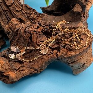 Swarovski Bella V necklace, EUC. Round gray crystal, paves on rose-gold tone.